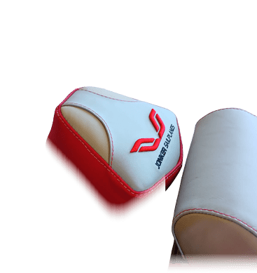Two red and white gloves. Description generated by AI